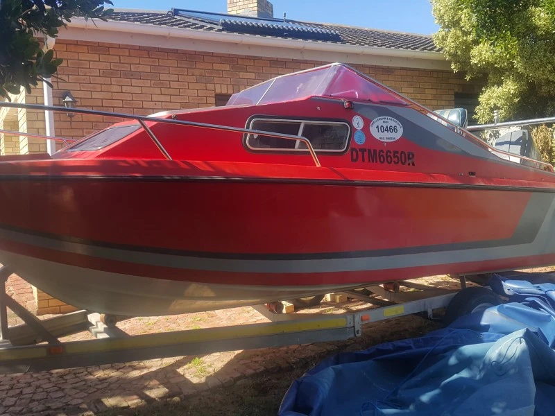 Viking 17ft cabin boat on doible axle trailer