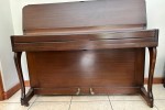 Kemble upright piano. Wood with steel inner