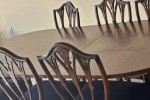 Dining room table, chairs 8 and sideboard