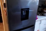 Microwave, tall fridge 2doors above another/2 sections, medium TV cabi...