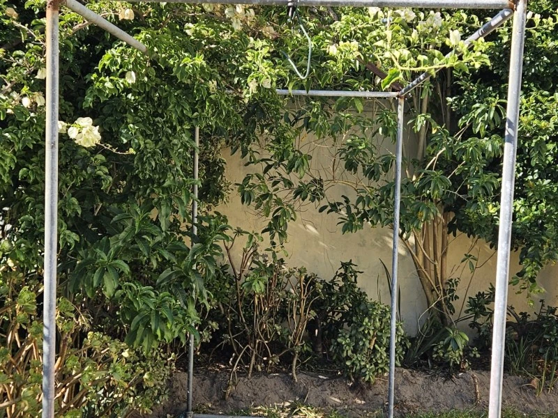 Garden enclosure frame for atrium