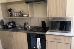 Bed, Tv, Tv stand, Coffee table, Couch, Fridge, Pots,cutlery, Carpets