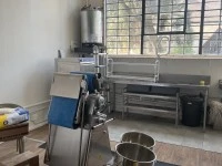 Kitchen equipments: commercial fridge, mixers, tables, machines