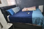 Queen Bed, 2 Suitcases, Travel Bag