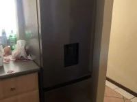 Corner sofa, table and 4 chairs, fridge, washing machine, 2 single bed...