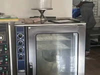 Kitchen equipments: commercial fridge, mixers, tables, machines
