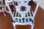 Cast iron six seater patio table, Six cast iron patio chairs