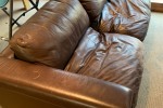Two seater leather couch, Large L-shaped work desk, 6 seater wooden ta...