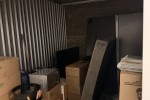 Queen bed, Fridge, Washing machine, Headboard, Boxes