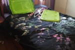 Queen size bed, dresser, drawers, side table, small desk and self with...