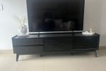 Queen bed, 2 seater couch, Single door fridge, TV stand and coffee tab...