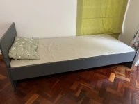 Double bed, Bunker bed, Fridge, Three seater couch and an ottoman