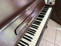 Kemble upright piano. Wood with steel inner