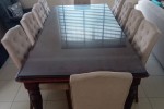 10 seater dining room table with a glass top, 10 dining chairs (10)