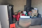 Queen bed, Fridge, Sofa, Boxes, Luggage