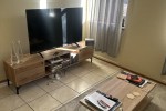Bed, Tv, Tv stand, Coffee table, Couch, Fridge, Pots,cutlery, Carpets