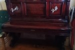 Upright steel frame piano