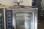 Kitchen equipments: commercial fridge, mixers, tables, machines