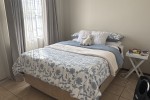 Double bed, Small table, Study desk x2, Coffee table, Couch, Rug, TV u...