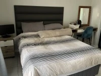 Double bed, Lounge suite, Desk, Table and chairs