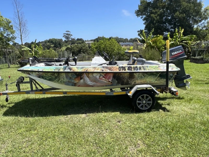 Small bass boat on trailer