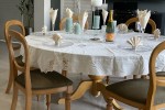 One six seater round dining room table, 6 Busselback dining chairs, 1 ...