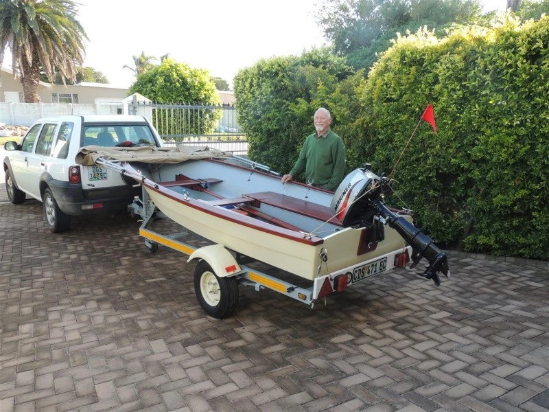 Classic River boat, Mariner outboard and galvanised trailer