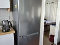 Single door fridge, Small box freezer, Occasional table, Occasional ta...