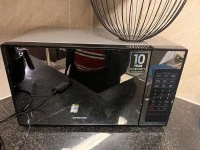 Queen bed, L-shaped couch, Bunk bed, Front loader washing machine, Tv ...