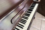 Kemble upright piano. Wood with steel inner