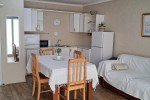 Single bed, fridge, 6 seat table, lazy boy chair