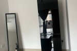 Queen bed, 2 seater couch, Single door fridge, TV stand and coffee tab...
