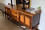 Dining room table and cupboard.