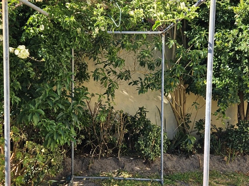 Garden enclosure frame for atrium