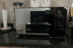 Queen bed, 2 seater couch, Single door fridge, TV stand and coffee tab...