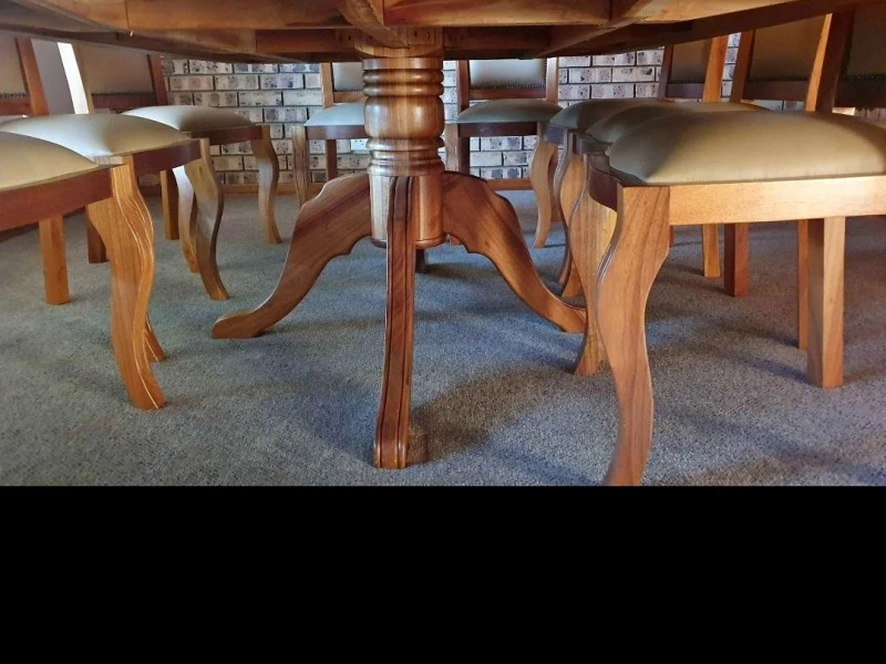 Heavy solid wood Dinning table and 10 chairs