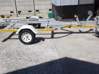 Inflatable boat Small 3.2metre rubber duck on unlicensed trailer