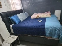 Queen Bed, 2 Suitcases, Travel Bag