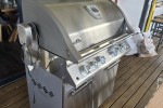 Outdoor chairs, gas braai and gas cylinder