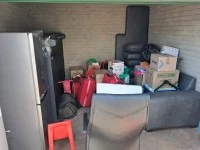 Queen bed, Fridge, Sofa, Boxes, Luggage