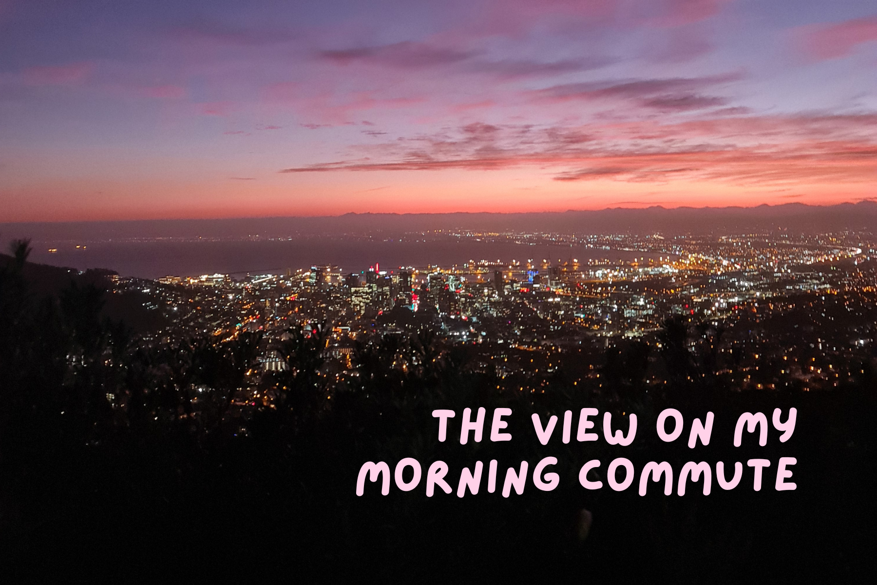View of Cape Town CBD city lights at sunrise