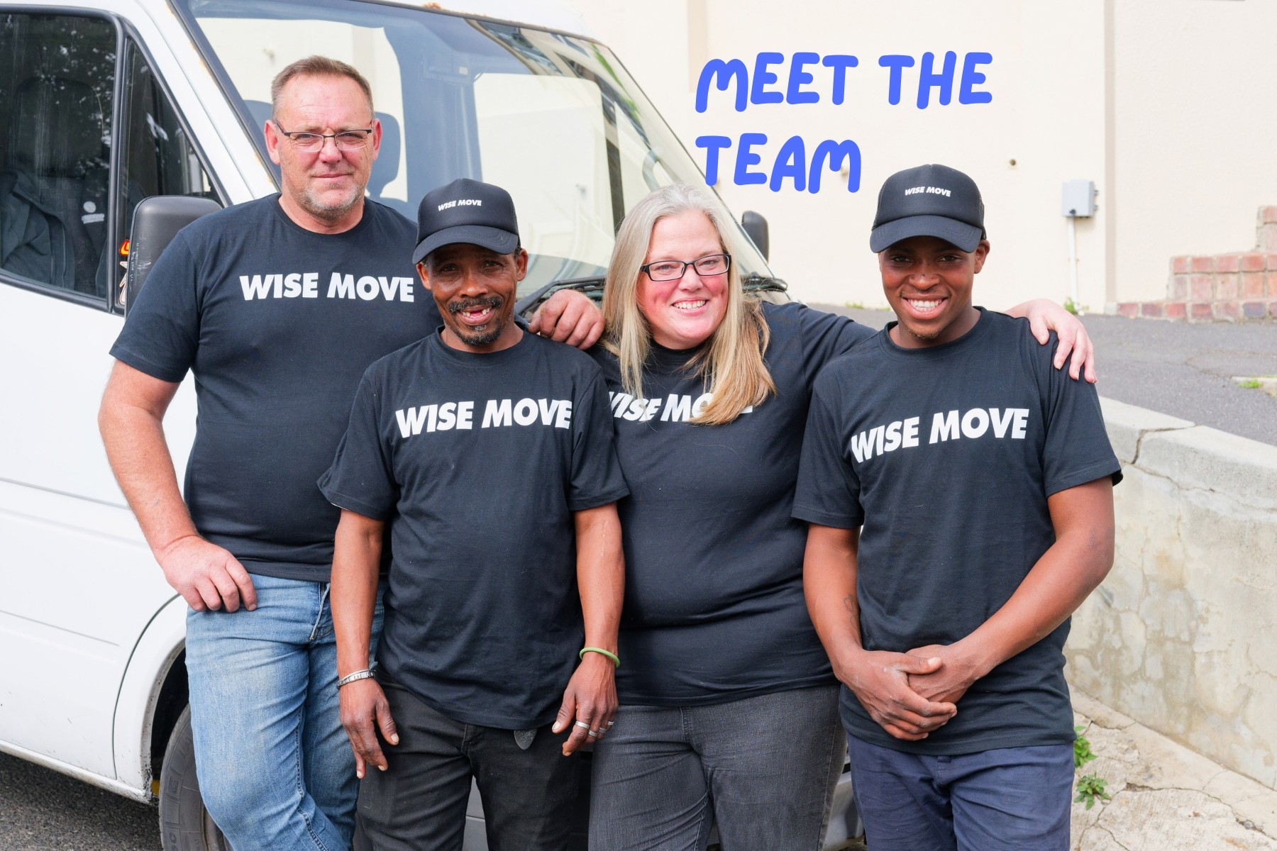 A Wise Move supermover, standing infront of their truck