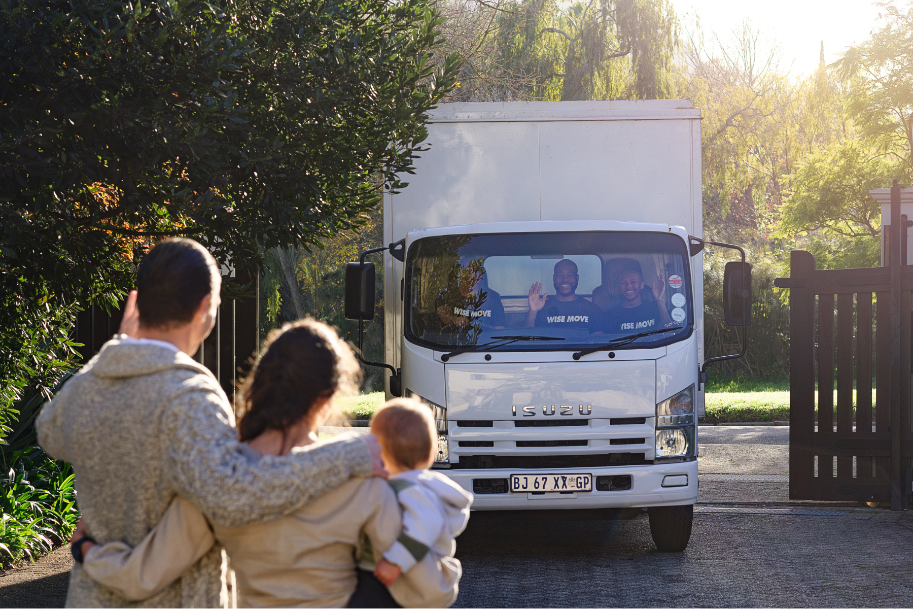 Family welcoming moving truck arriving in Johannesburg